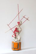 Marliz Frencken, Woman with child sting by skewers, 2011 60 cm, clay, wood and oil on resin